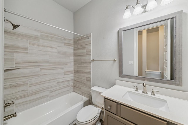 full bathroom with tiled shower / bath combo, vanity, and toilet