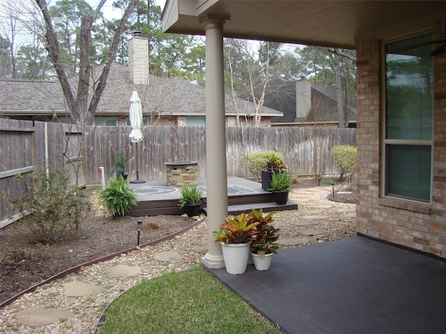 view of patio featuring a fenced backyard