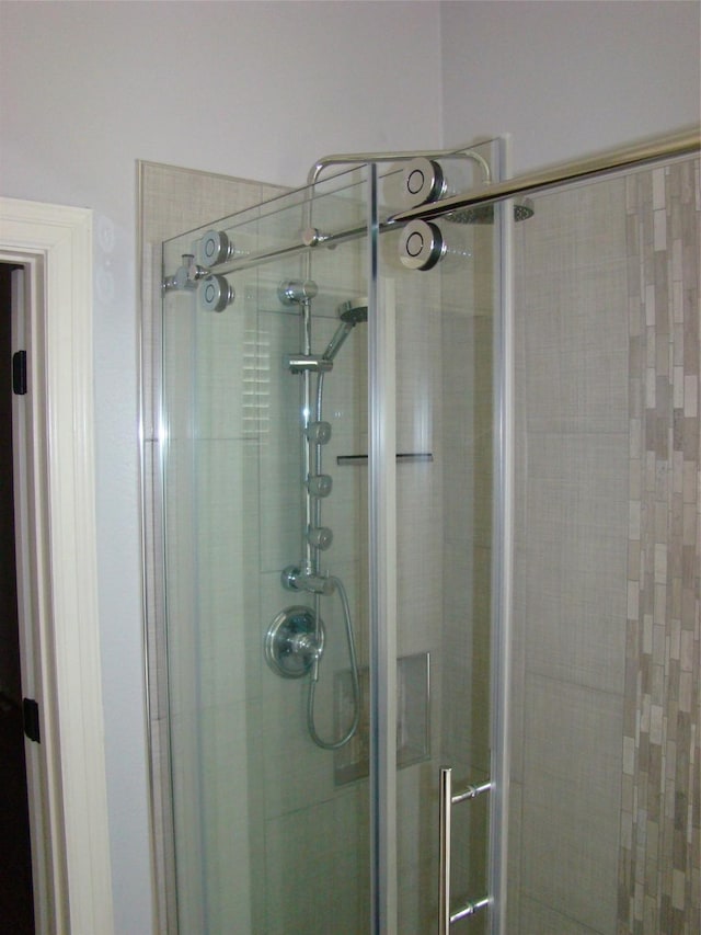 bathroom featuring a stall shower