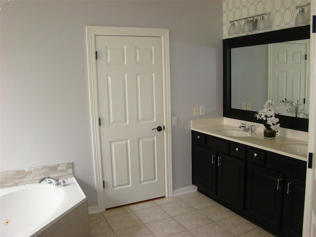 full bath with tile patterned flooring, a garden tub, a sink, and double vanity