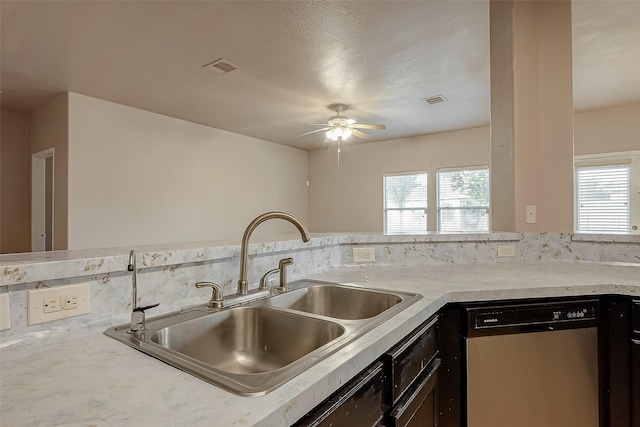 kitchen with ceiling fan, dishwasher, and sink