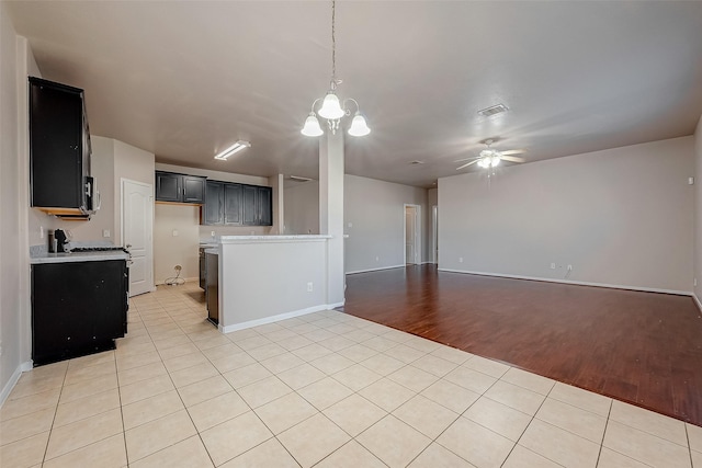 kitchen featuring light tile patterned flooring and ceiling fan