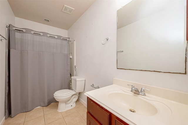 bathroom with tile patterned flooring, vanity, curtained shower, and toilet