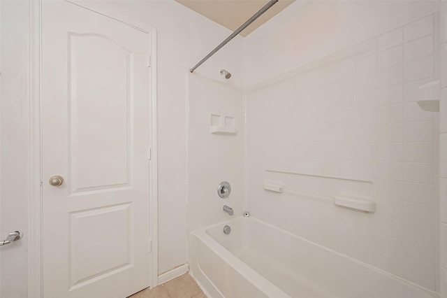 bathroom featuring tile patterned floors and tub / shower combination