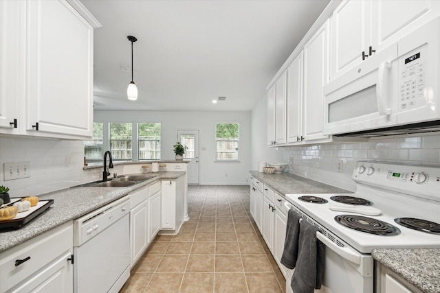 kitchen featuring white cabinetry, white appliances, light tile patterned flooring, and tasteful backsplash