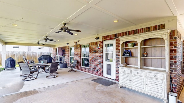 view of patio / terrace featuring ceiling fan