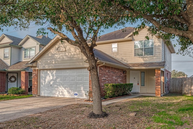 view of front of property with a garage