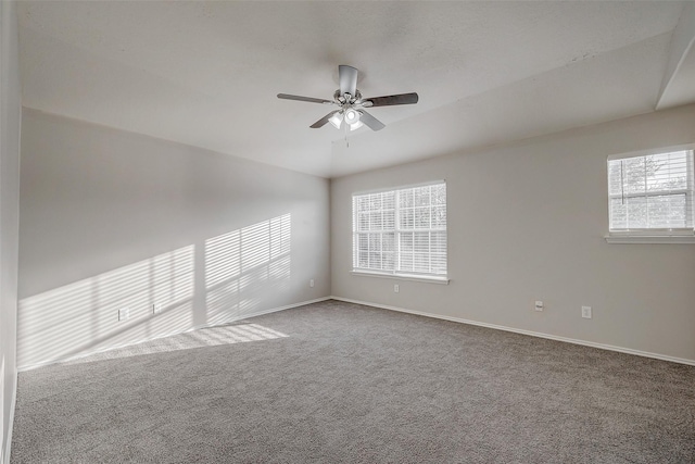 carpeted empty room with ceiling fan