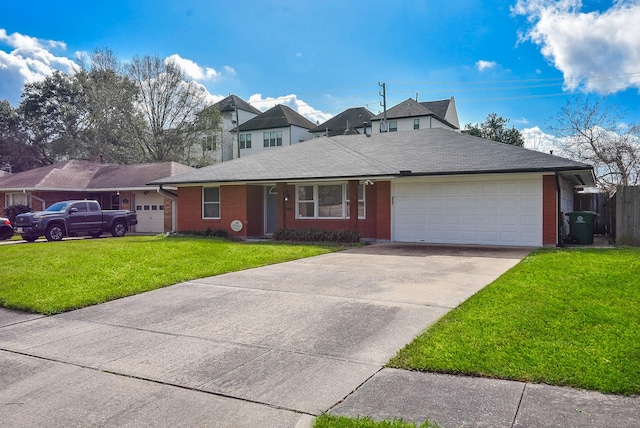 view of front of home featuring a garage and a front yard