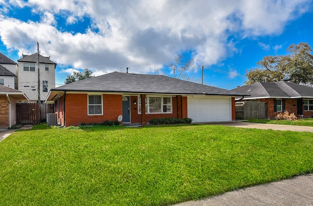 single story home featuring central AC, a garage, and a front lawn