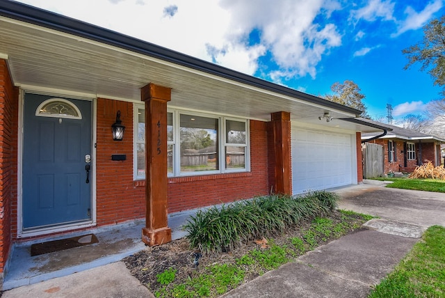 property entrance with a garage