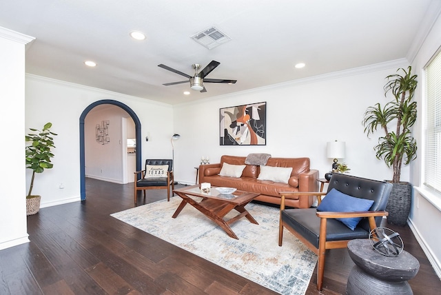 living room featuring ornamental molding, dark hardwood / wood-style floors, and ceiling fan