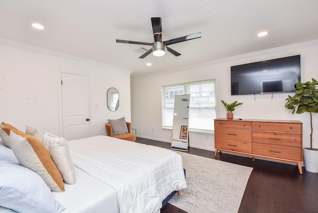 bedroom with ornamental molding, ceiling fan, and dark hardwood / wood-style flooring