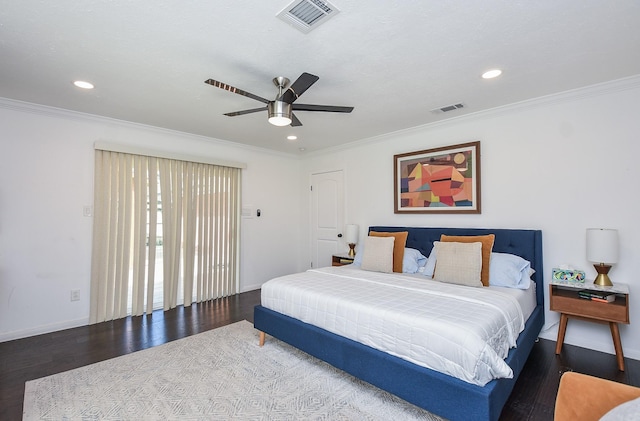 bedroom with crown molding, dark wood-type flooring, and ceiling fan