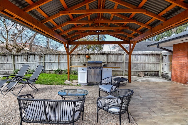 view of patio / terrace with a gazebo and grilling area