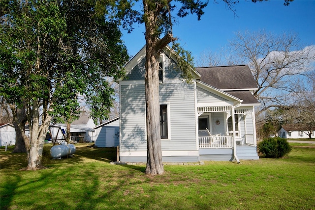 exterior space featuring a yard and a porch