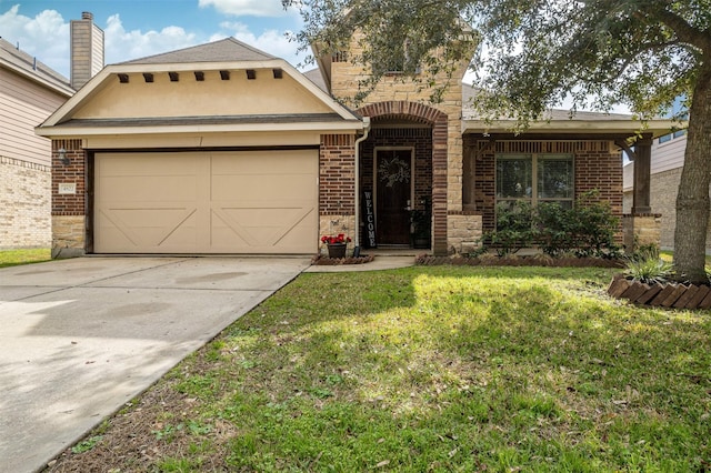 view of front of property with a garage and a front yard