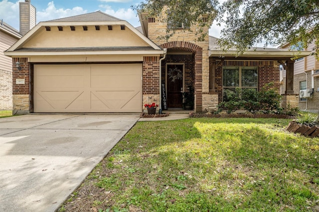 view of front of property with cooling unit, a garage, and a front yard