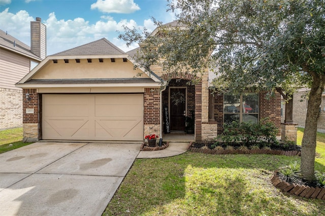 view of front of home with a garage and a front yard