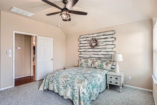 bedroom with lofted ceiling, carpet floors, and ceiling fan