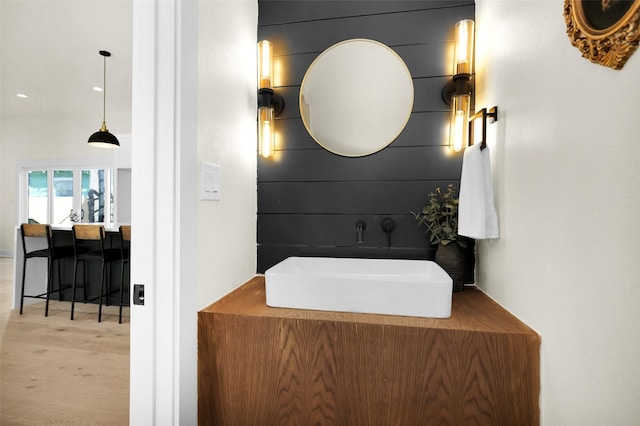 bathroom with wood-type flooring