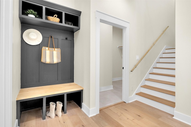 mudroom with wood-type flooring