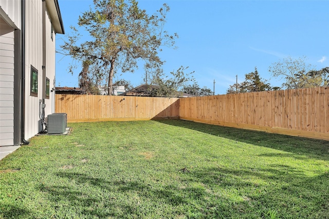 view of yard featuring central AC