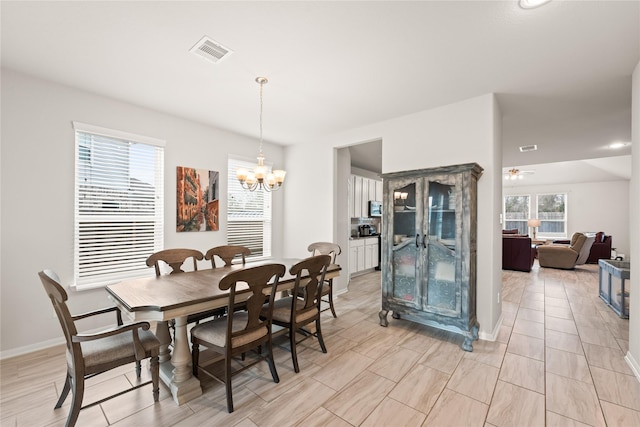 dining room with an inviting chandelier