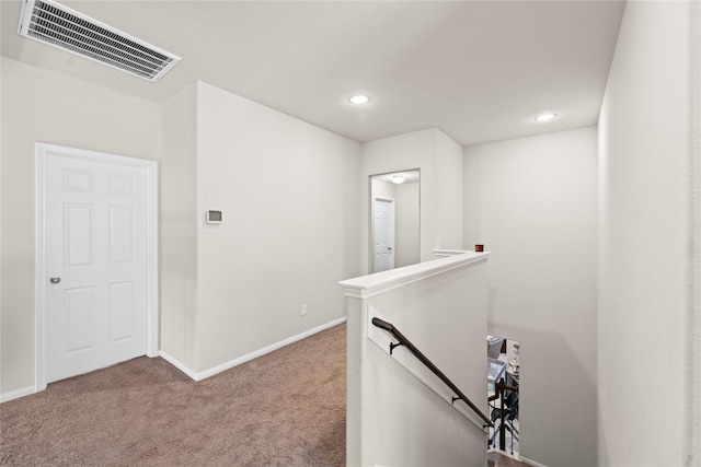 corridor featuring carpet floors
