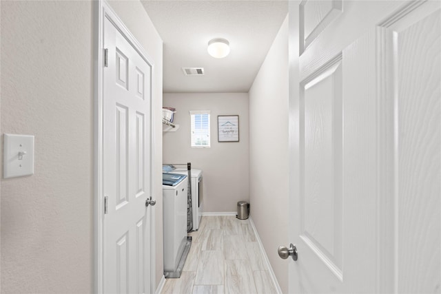 laundry room featuring washer and dryer