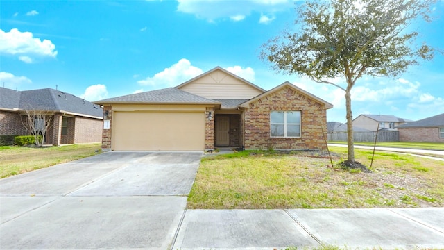 view of front facade featuring a garage and a front yard