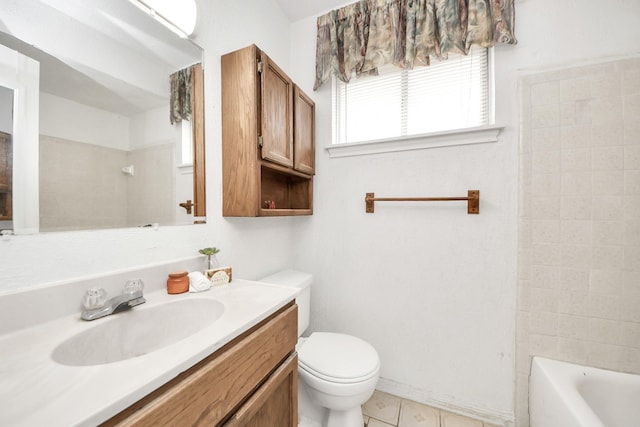 bathroom with vanity, toilet, and tile patterned flooring