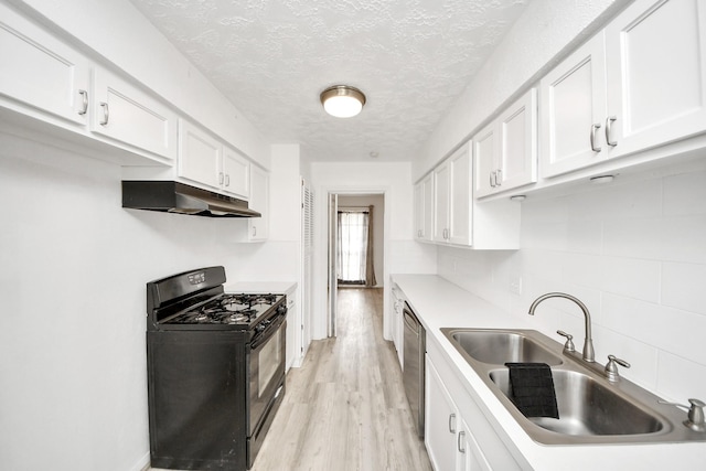 kitchen with white cabinetry, sink, stainless steel dishwasher, gas stove, and light wood-type flooring