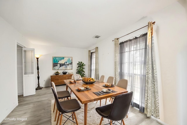 2008 Williamsburg Ct N, League City, TX 77573 - dining area featuring light wood-style floors