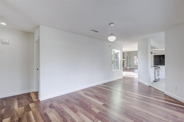 empty room featuring light hardwood / wood-style floors