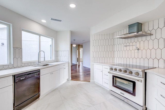 kitchen featuring sink, white cabinetry, electric range, dishwasher, and backsplash