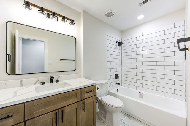 14142 Rosetta Dr, Cypress, TX 77429 - bathroom featuring toilet, vanity, marble look tile flooring, and shower / tub combination