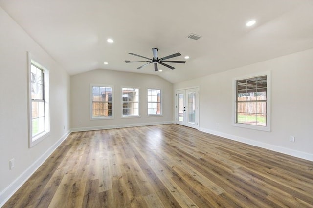14142 Rosetta Dr, Cypress, TX 77429 - unfurnished living room featuring ceiling fan, baseboards, wood finished floors, recessed lighting, and vaulted ceiling