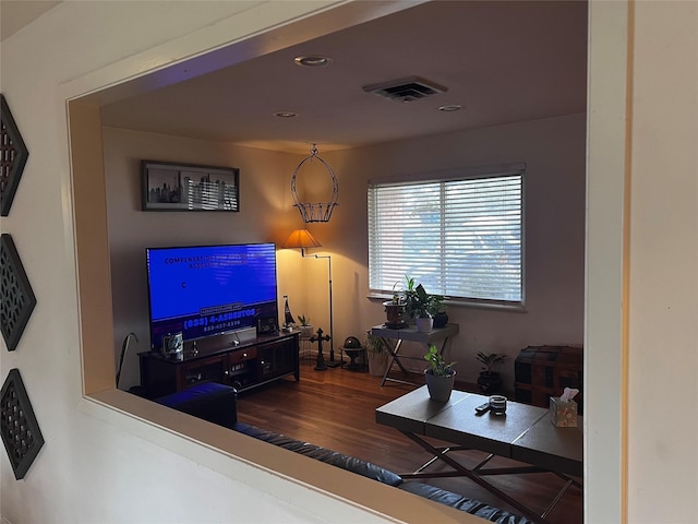 living room with dark hardwood / wood-style floors