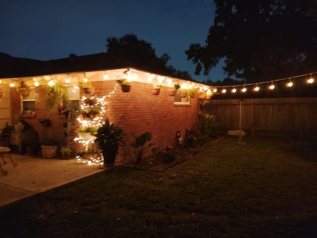 view of property exterior at twilight