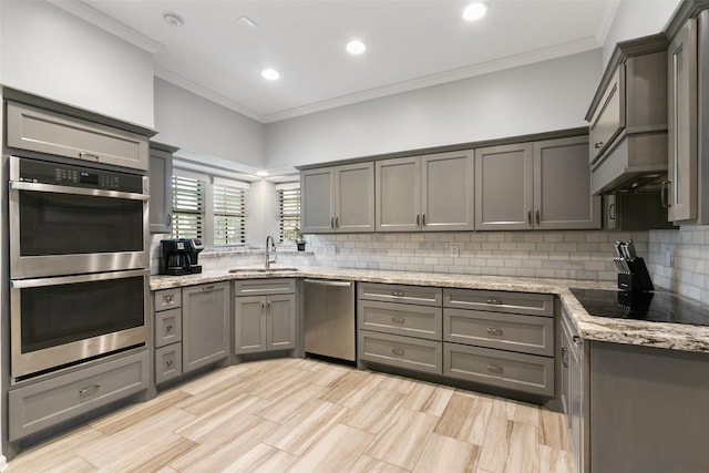 7315 Muirfield Valley Dr, Houston, TX 77095 - kitchen featuring a sink, gray cabinets, and stainless steel appliances