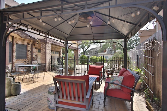 7315 Muirfield Valley Dr, Houston, TX 77095 - view of patio featuring fence, a gazebo, an outdoor living space, and outdoor dining area