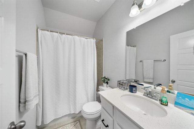 bathroom featuring vanity, curtained shower, and toilet