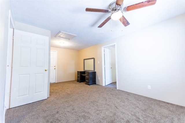 carpeted empty room with ceiling fan