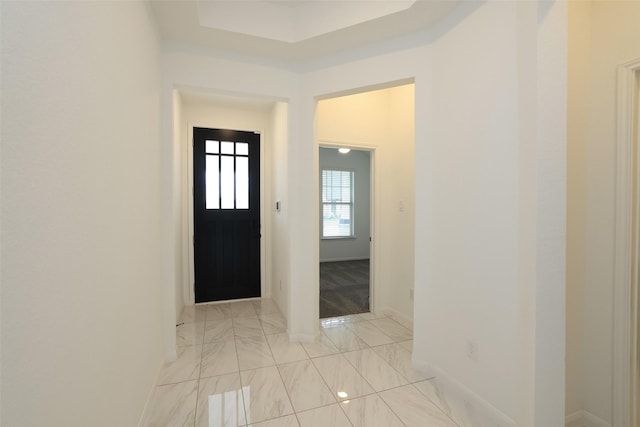 foyer with baseboards