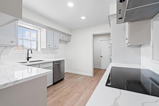 kitchen featuring sink, gray cabinets, black electric stovetop, stainless steel dishwasher, and light wood-type flooring