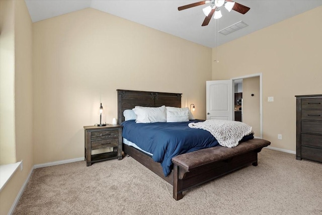 carpeted bedroom featuring vaulted ceiling and ceiling fan