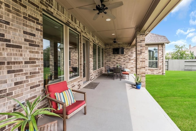 view of patio with ceiling fan