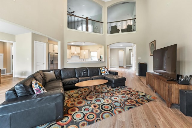 living room with light hardwood / wood-style floors