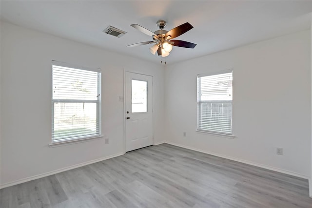 interior space with ceiling fan and light wood-type flooring